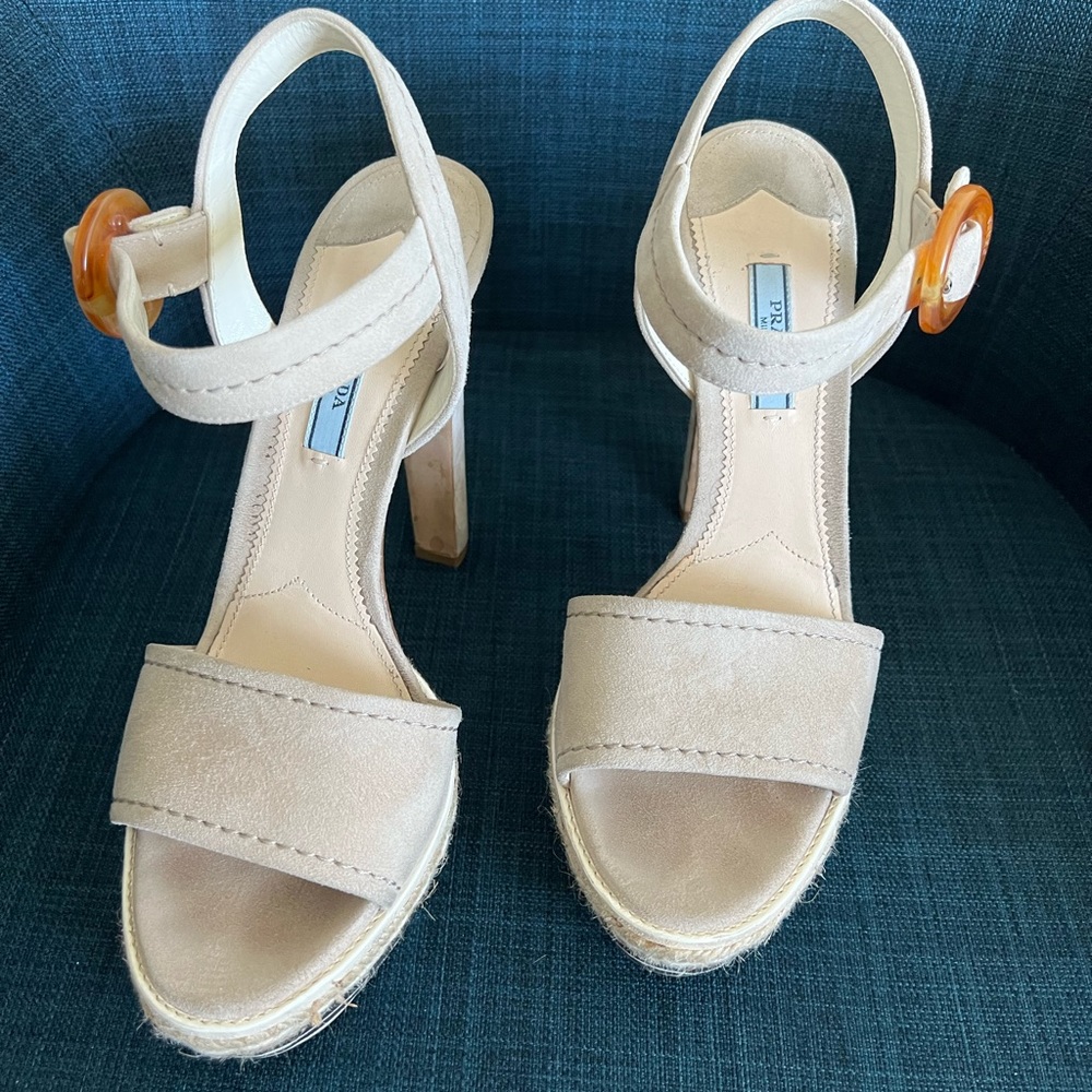 Beige Prada heels.